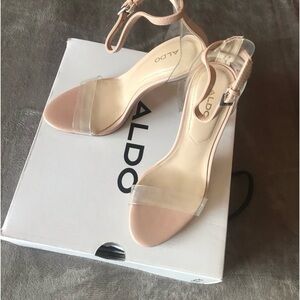 Never worn!  Very cute heels by aldo